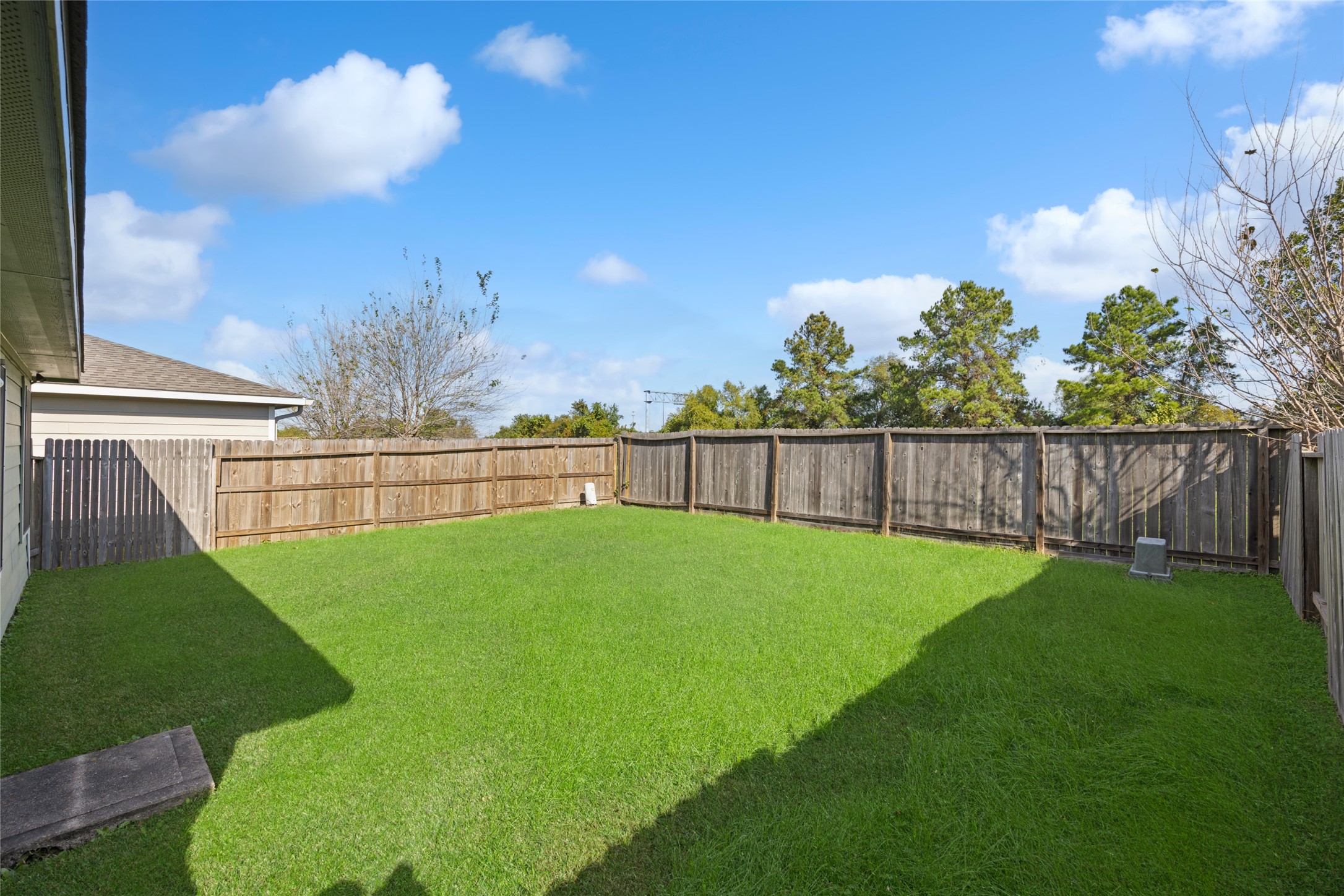 15926 Colonial Bridge Lane Houston, TX 77073 - Photo 23 of 27 a view of a backyard with a garden