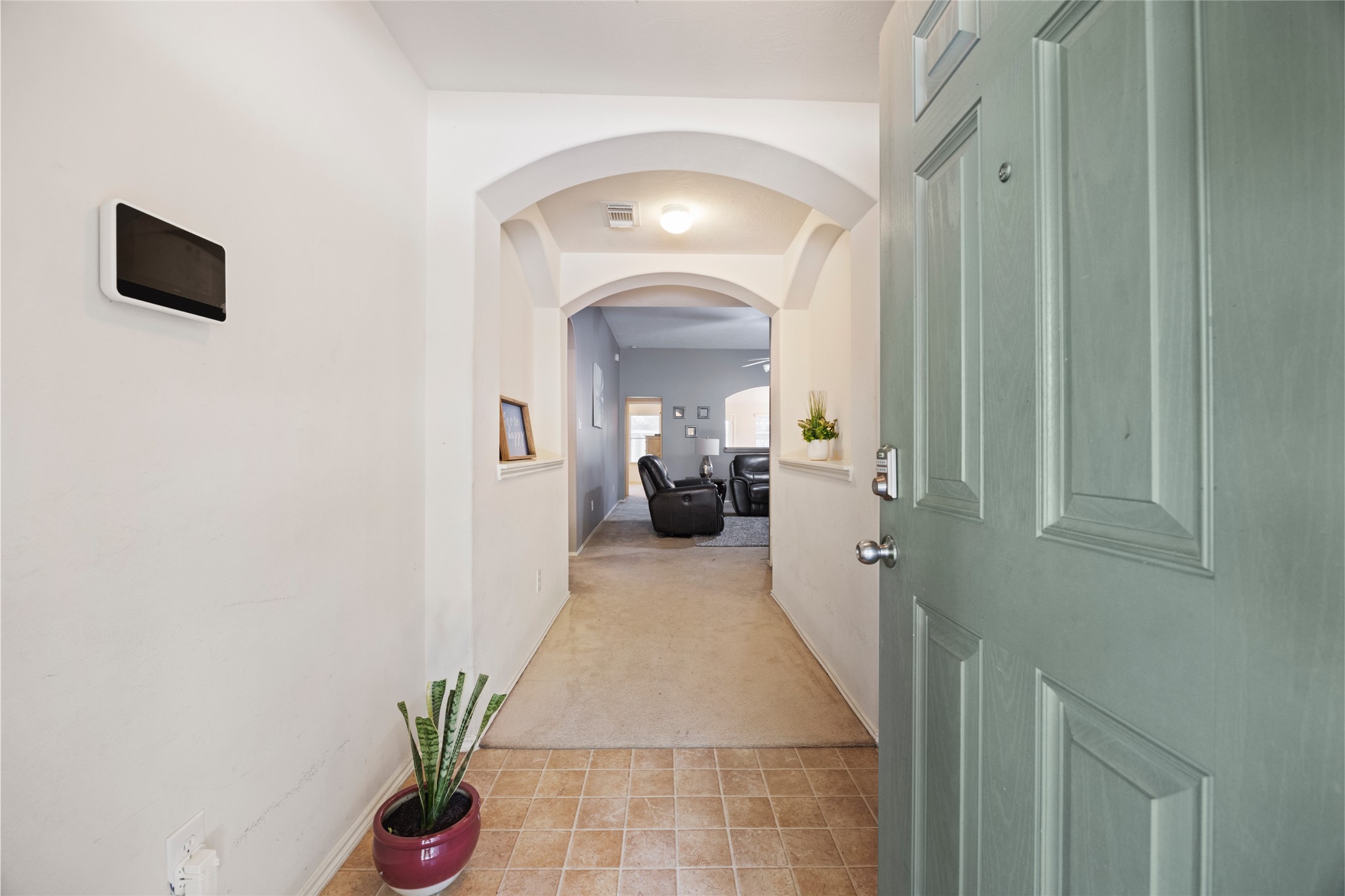 15926 Colonial Bridge Lane Houston, TX 77073 - Photo 4 of 27 a view of hallway with wooden floor