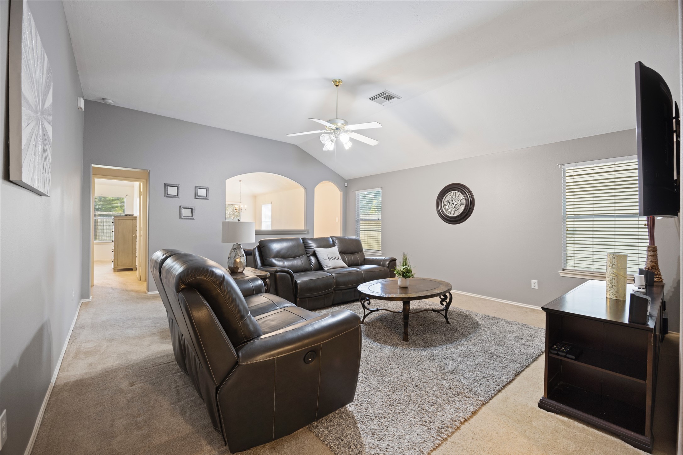 15926 Colonial Bridge Lane Houston, TX 77073 - Photo 6 of 27 a living room with furniture and a large window