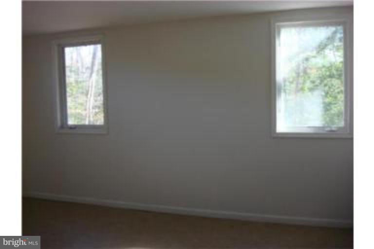 3511 Patuxent Road Huntingtown, MD 20639 - Photo 20 of 23 an empty room with a window