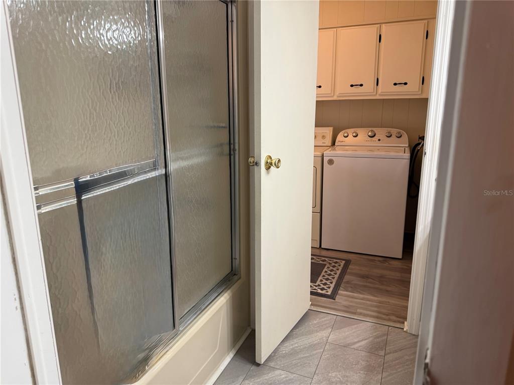 8010 Highpoint Boulevard Brooksville, FL 34613 - Photo 19 of 32 a room with storage and utility