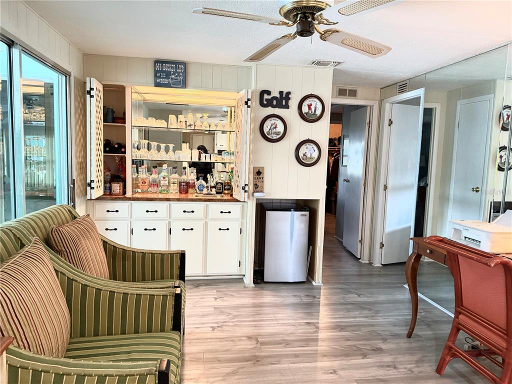 8010 Highpoint Boulevard Brooksville, FL 34613 - Photo 10 of 32 a bedroom with furniture and a window