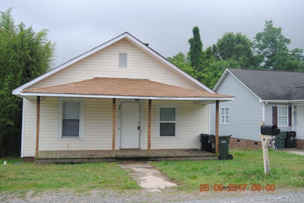 87 Sunderland Road Southwest Concord, NC 28027 - Photo 1 of 1 a front view of a house with a yard