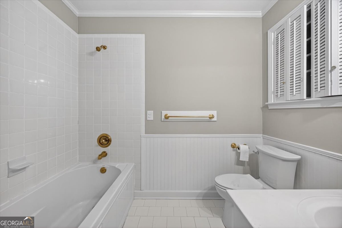 4555 Old Club Road Macon, GA 31210 - Photo 19 of 38 a bathroom with a toilet and bathtub