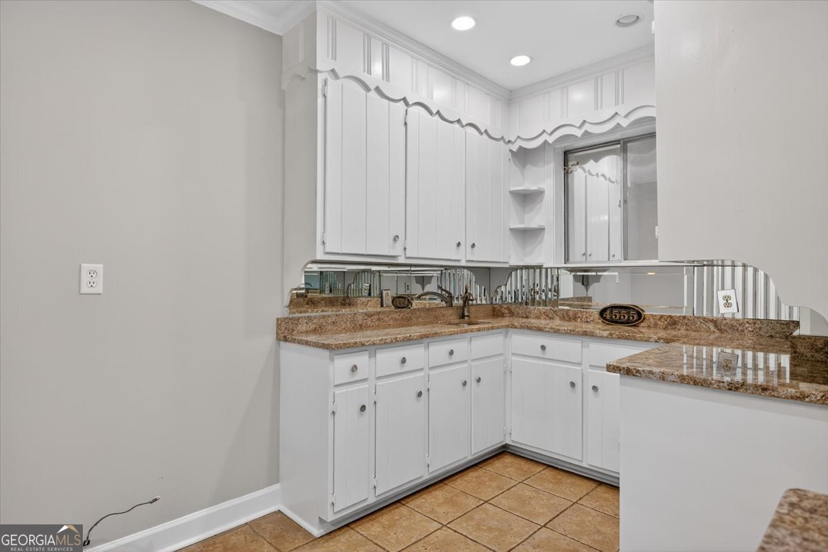 4555 Old Club Road Macon, GA 31210 - Photo 8 of 38 a bathroom with a sink and a mirror