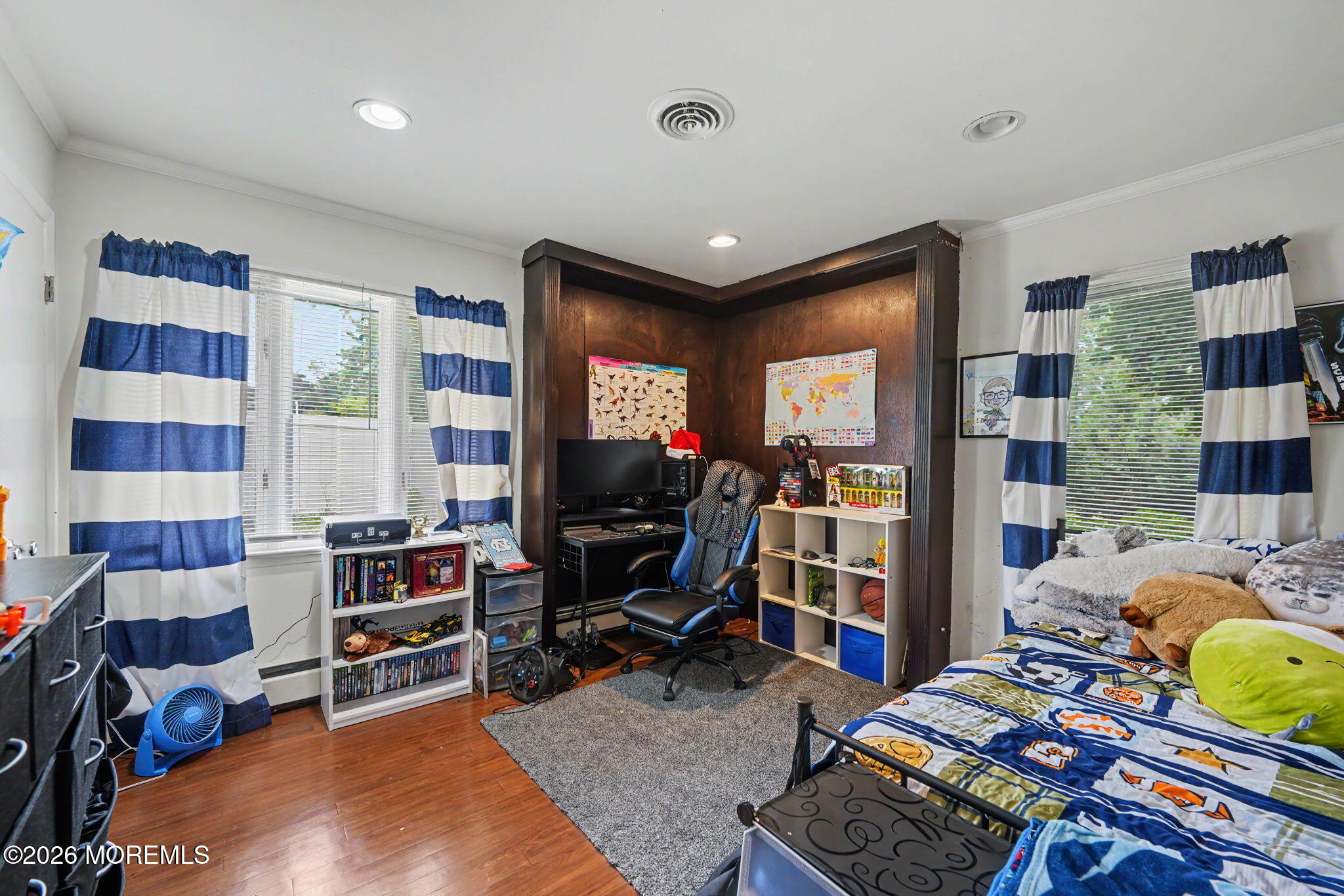 699 Aldrich Road Howell, NJ 07731 - Photo 17 of 30 a bedroom with furniture and a flat screen tv