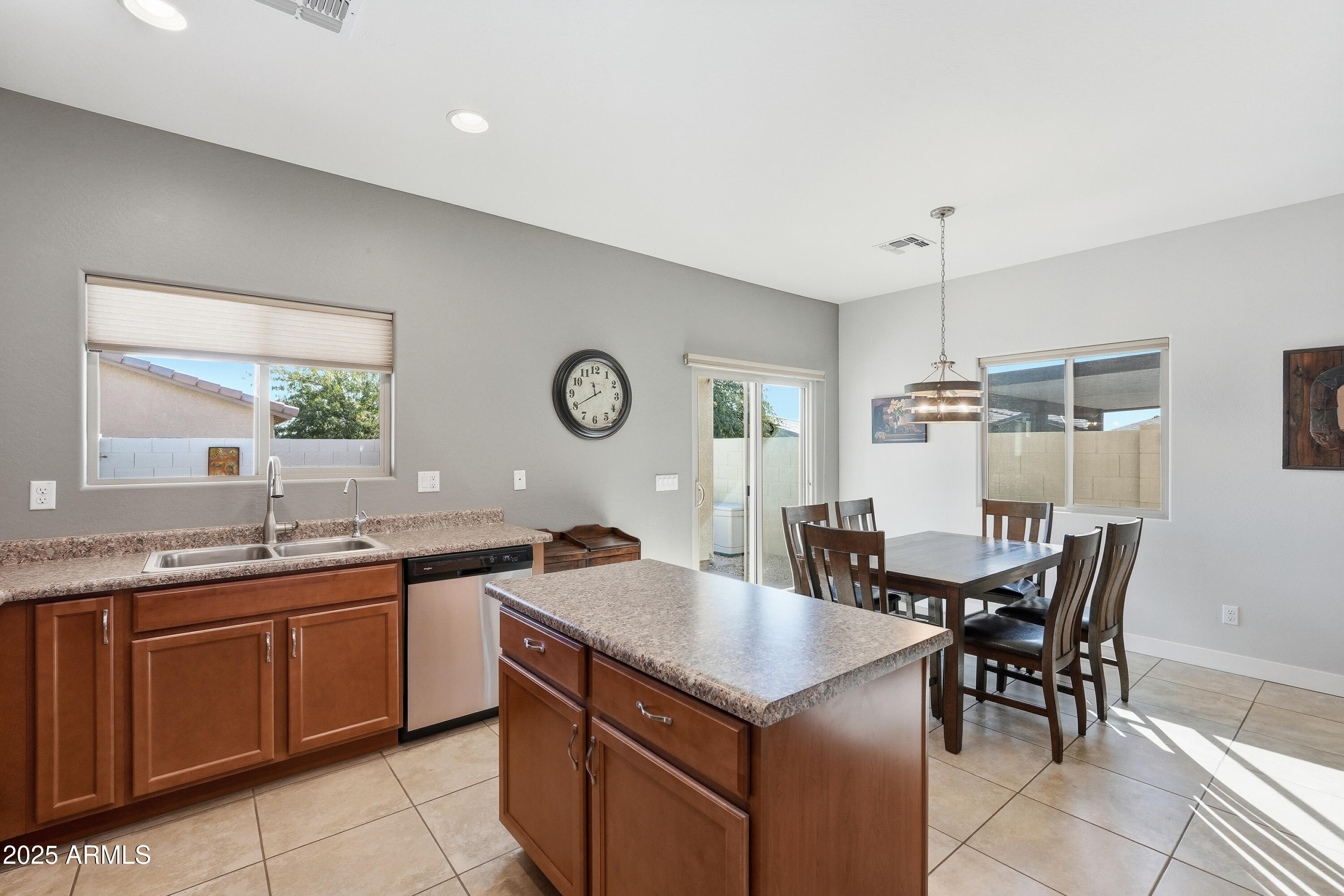 1815 South Hayley Road Apache Junction, AZ 85119 - Photo 10 of 33 a kitchen with a table and chairs in it