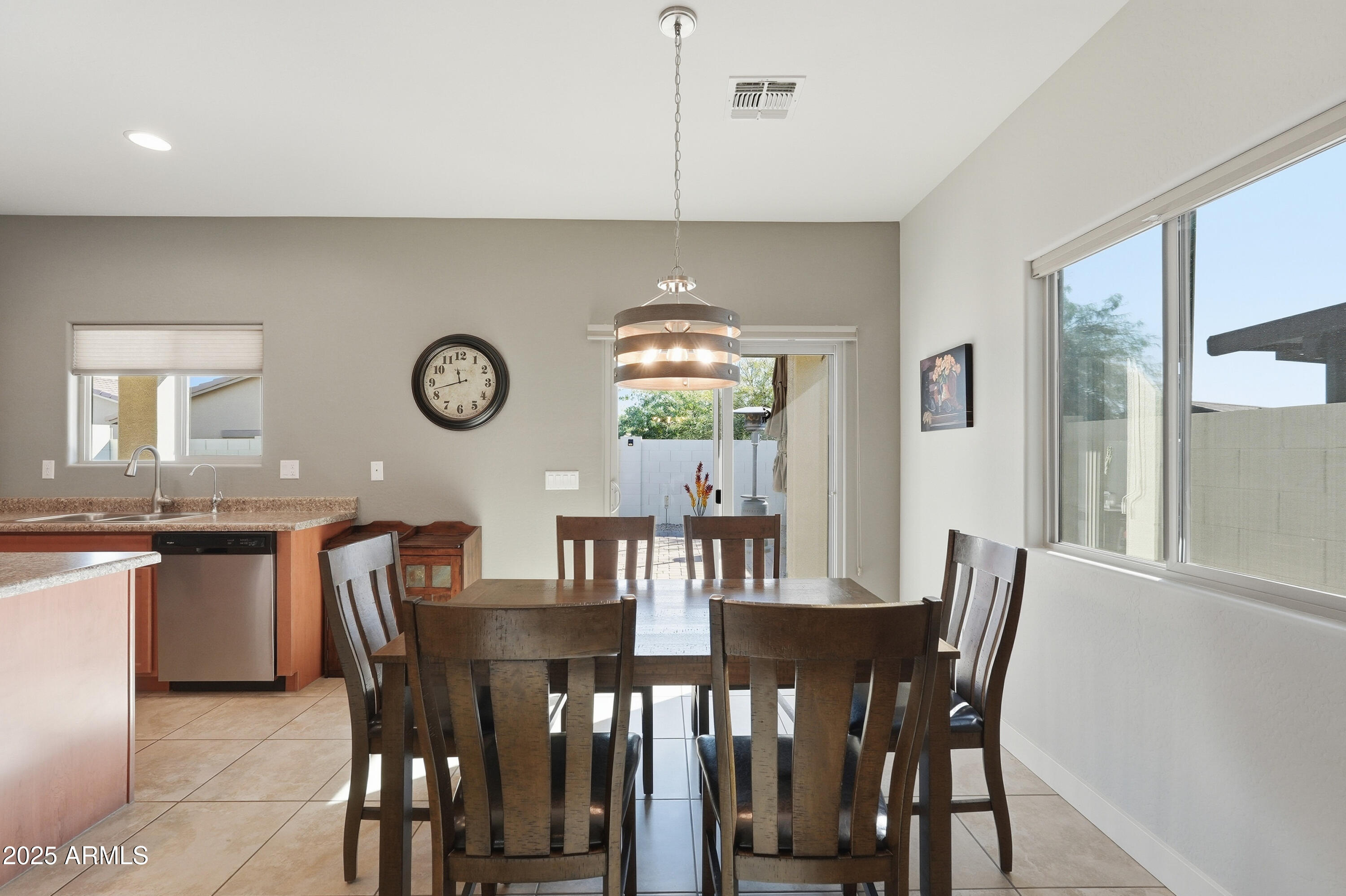 1815 South Hayley Road Apache Junction, AZ 85119 - Photo 14 of 33 a view of a dining room with furniture window and outside view