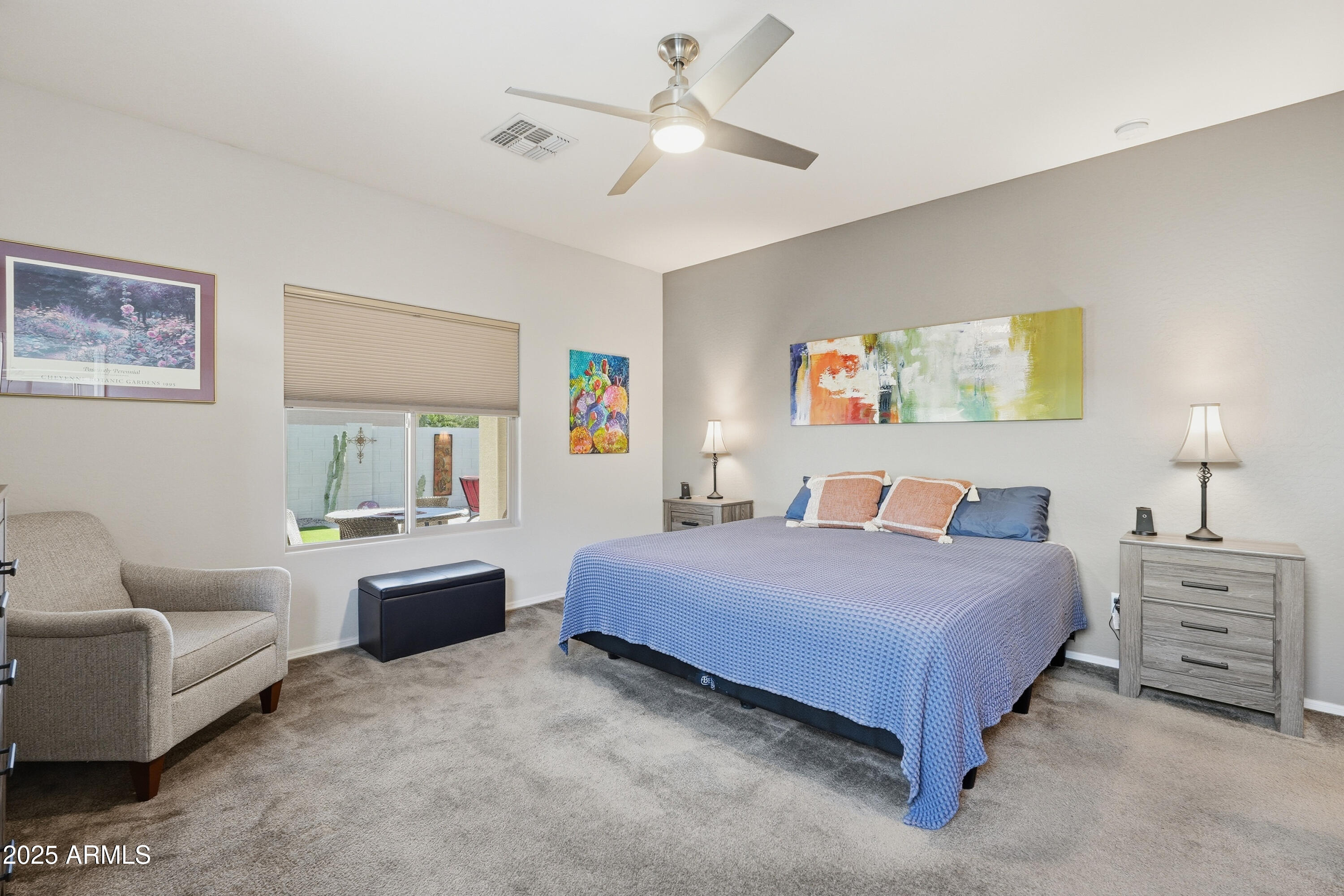 1815 South Hayley Road Apache Junction, AZ 85119 - Photo 18 of 33 a bedroom with a bed couch and window
