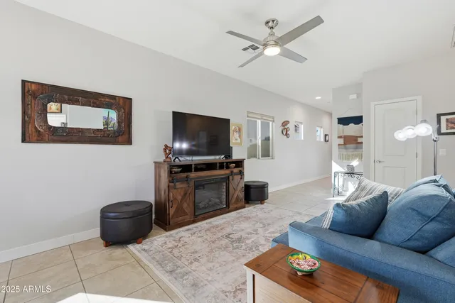 a living room with furniture and a table