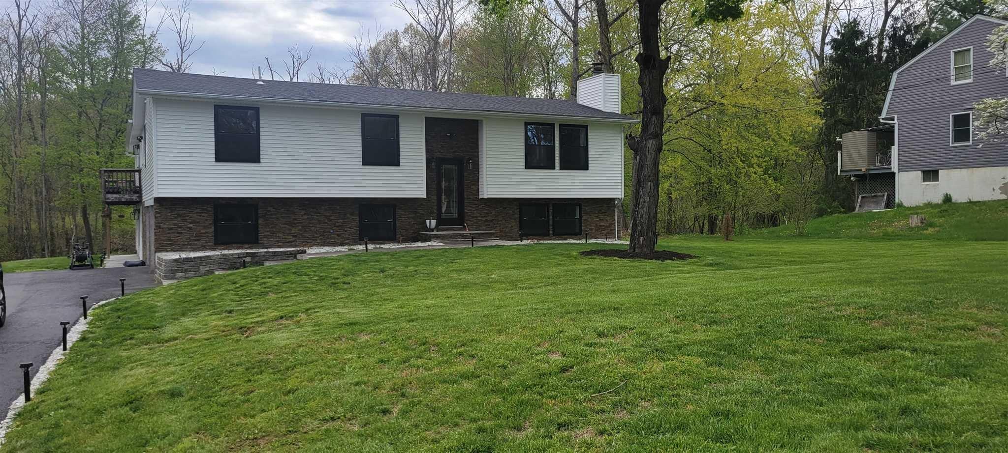 53 Lawrence Road, Unit 1 Hyde Park, NY 12538 - Photo 1 of 1 a view of house with backyard