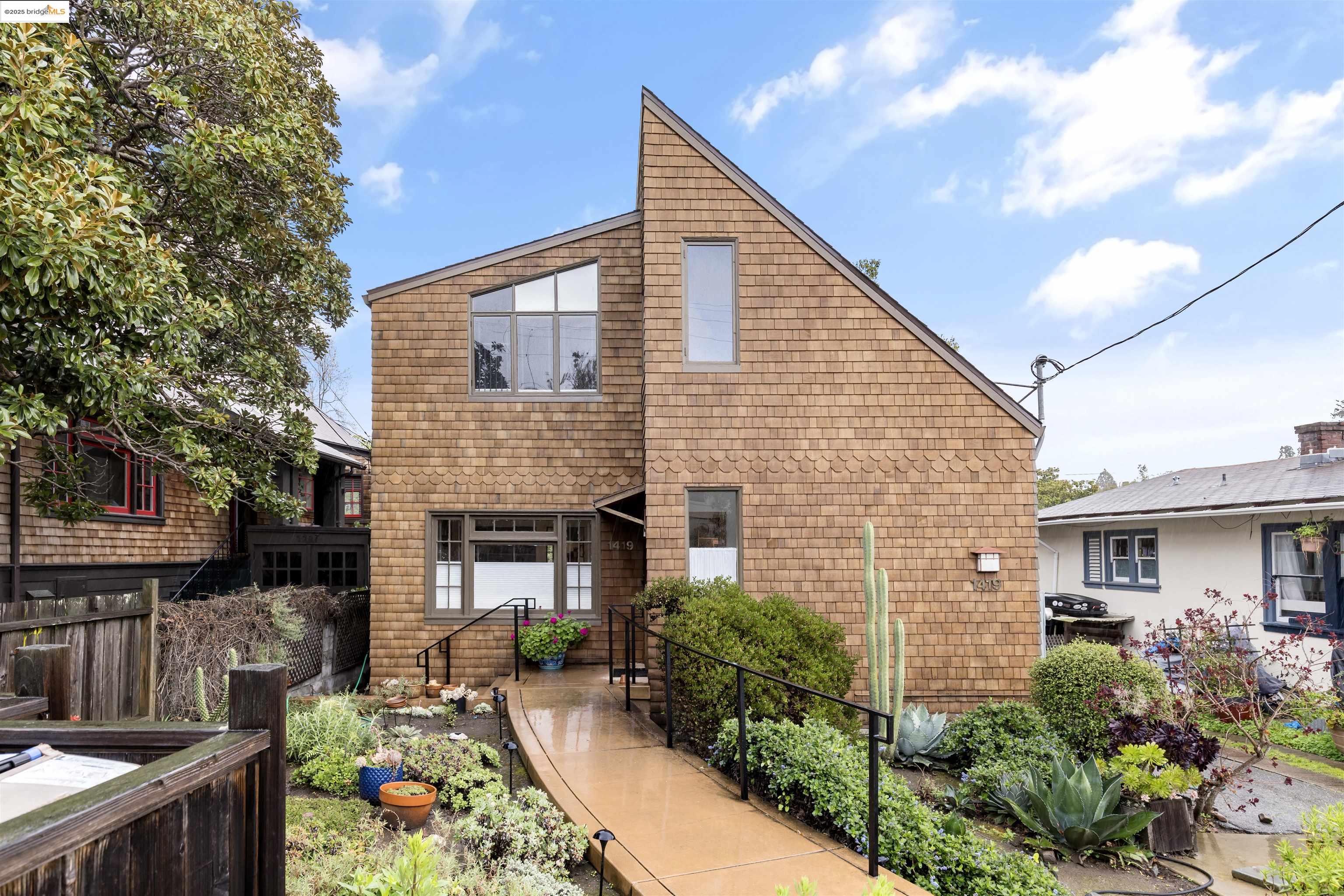 1419 Grant Street Berkeley, CA 94703 - Photo 1 of 1 a front view of a house with garden