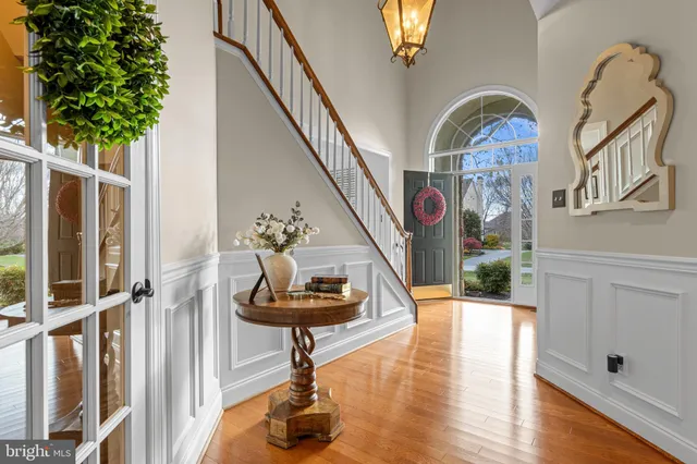 a dining room with furniture window wooden floor