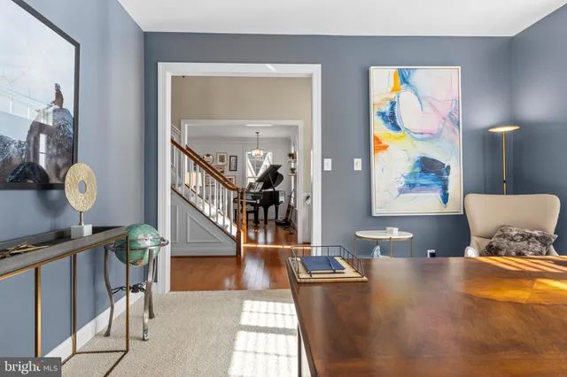 a kitchen with refrigerator and microwave