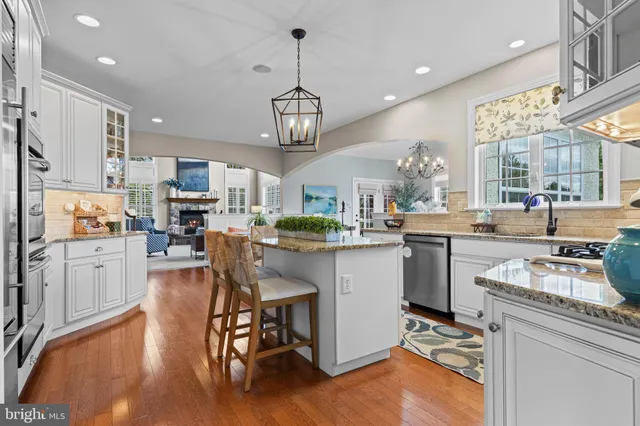 a bedroom with furniture and a potted plant