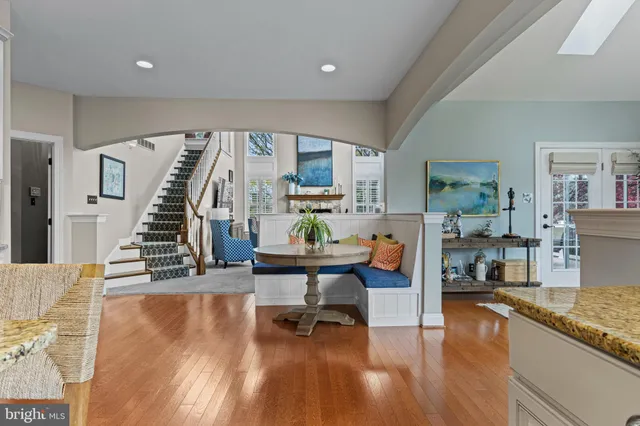a view of a livingroom with furniture window and wooden floor