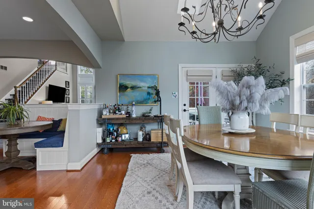 a view of a livingroom with furniture and a flat screen tv