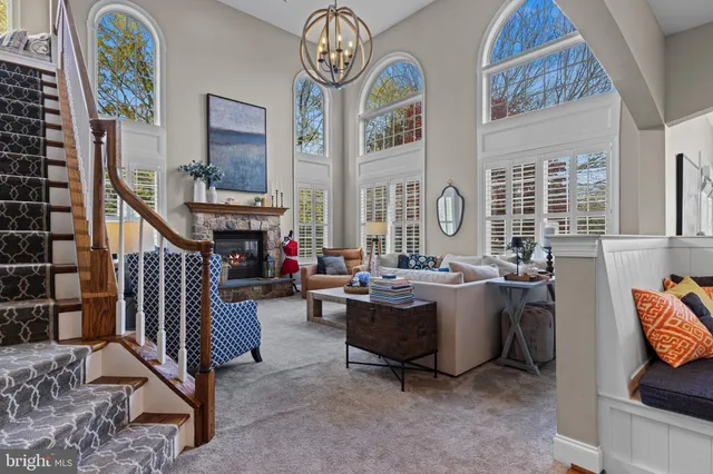 a view of a livingroom with furniture and a flat screen tv