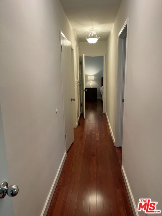 10655 Wilshire Boulevard, Unit 201 Los Angeles, CA 90024 - Photo 11 of 21 a view of a hallway with wooden floor
