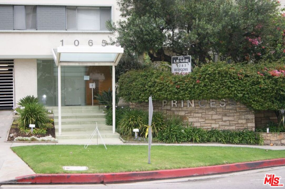 10655 Wilshire Boulevard, Unit 201 Los Angeles, CA 90024 - Photo 21 of 21 a view of a house with a yard