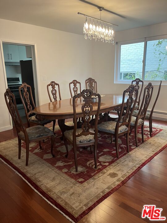 10655 Wilshire Boulevard, Unit 201 Los Angeles, CA 90024 - Photo 5 of 21 a view of a dining room with furniture