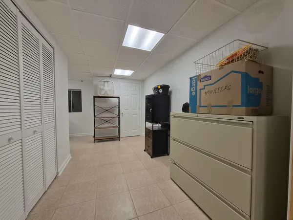 a view of a storage & utility room with washer and dryer