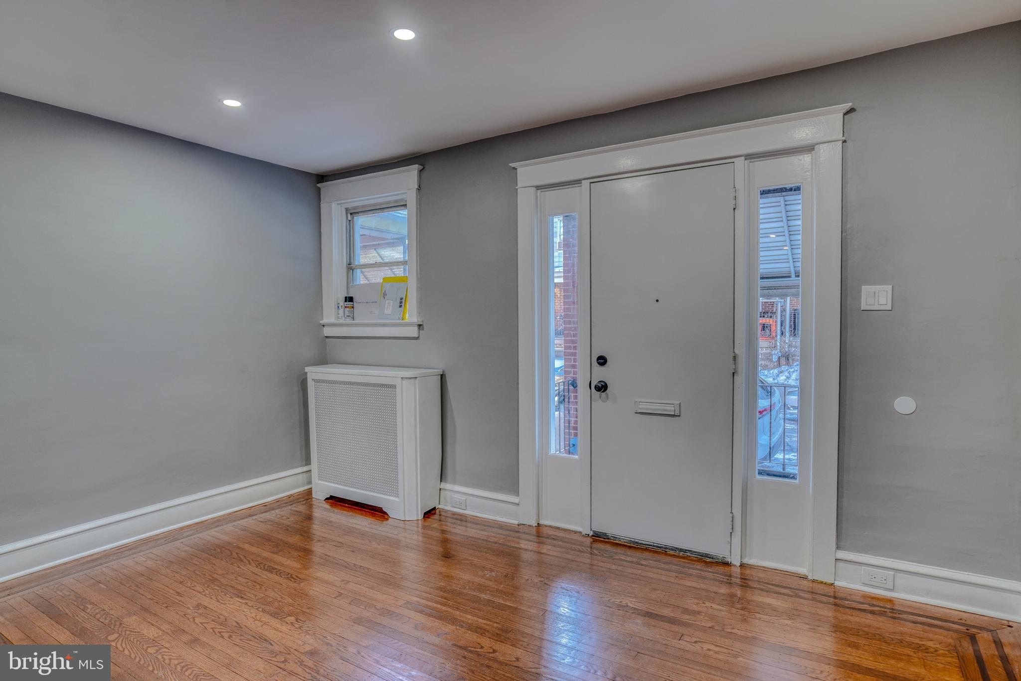 2135 Granite Street Philadelphia, PA 19124 - Photo 16 of 34 a view of an empty room with wooden floor and closet