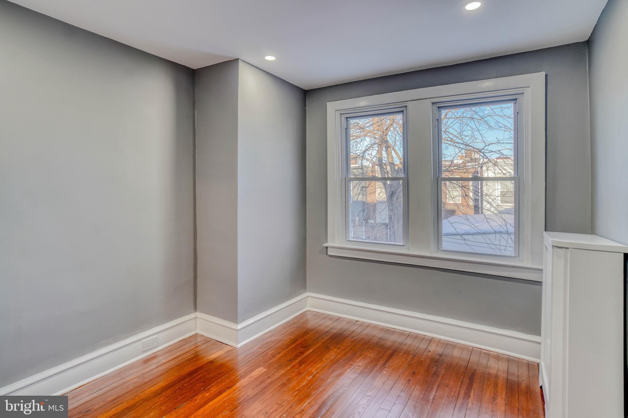2135 Granite Street Philadelphia, PA 19124 - Photo 18 of 34 a view of room with window and wooden floor