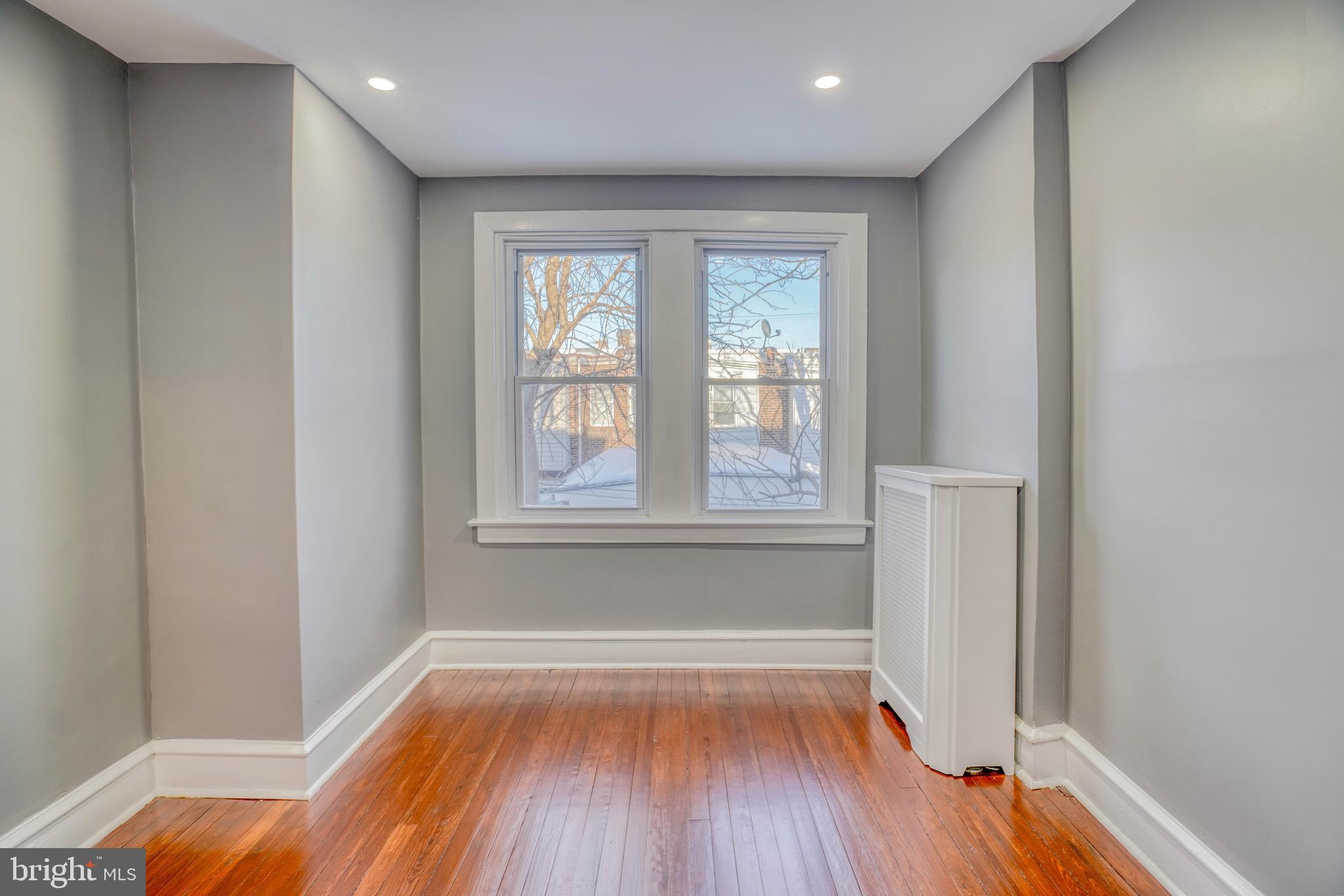 2135 Granite Street Philadelphia, PA 19124 - Photo 19 of 34 a view of empty room with wooden floor and fan