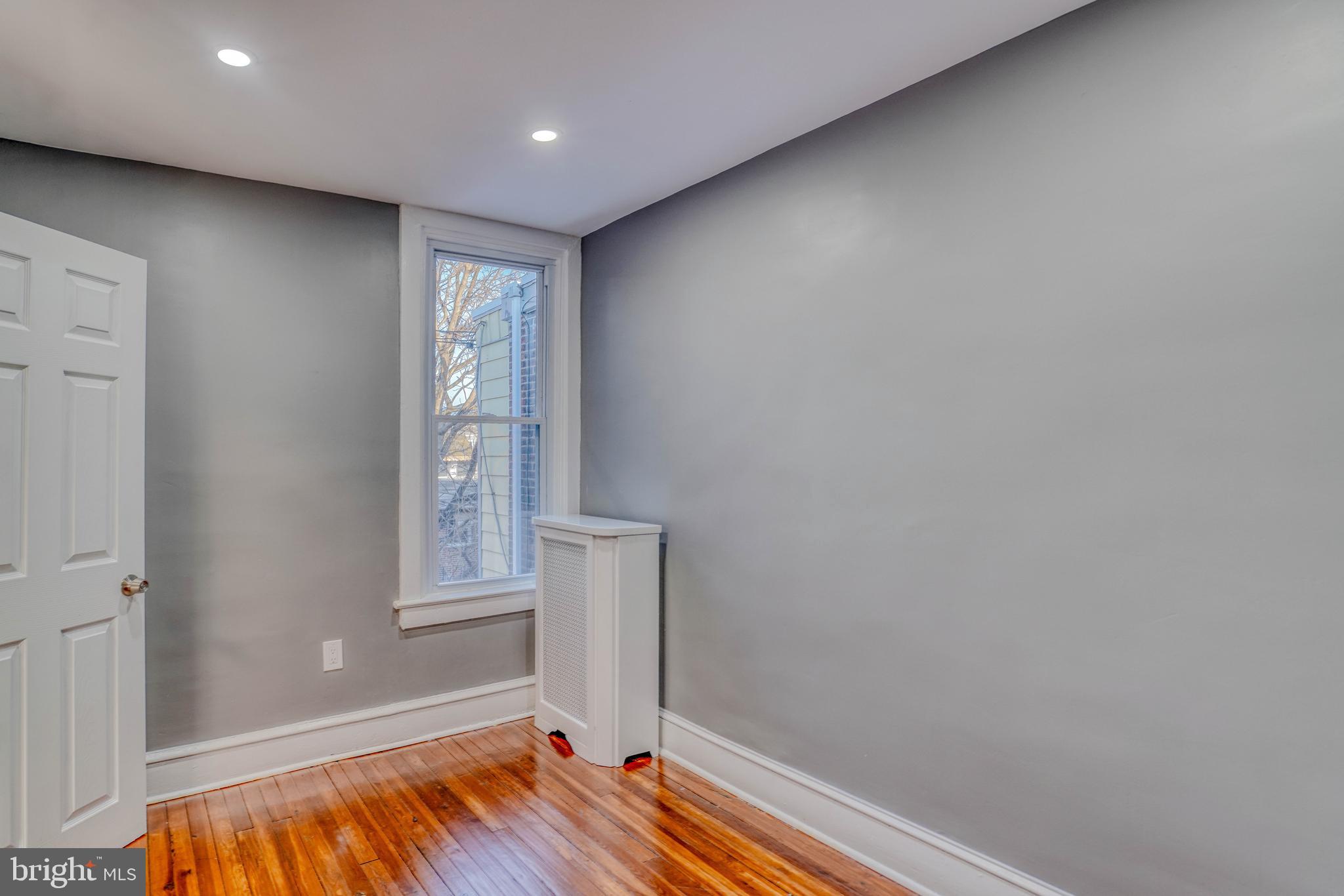 2135 Granite Street Philadelphia, PA 19124 - Photo 22 of 34 a view of room with hardwood floor and window