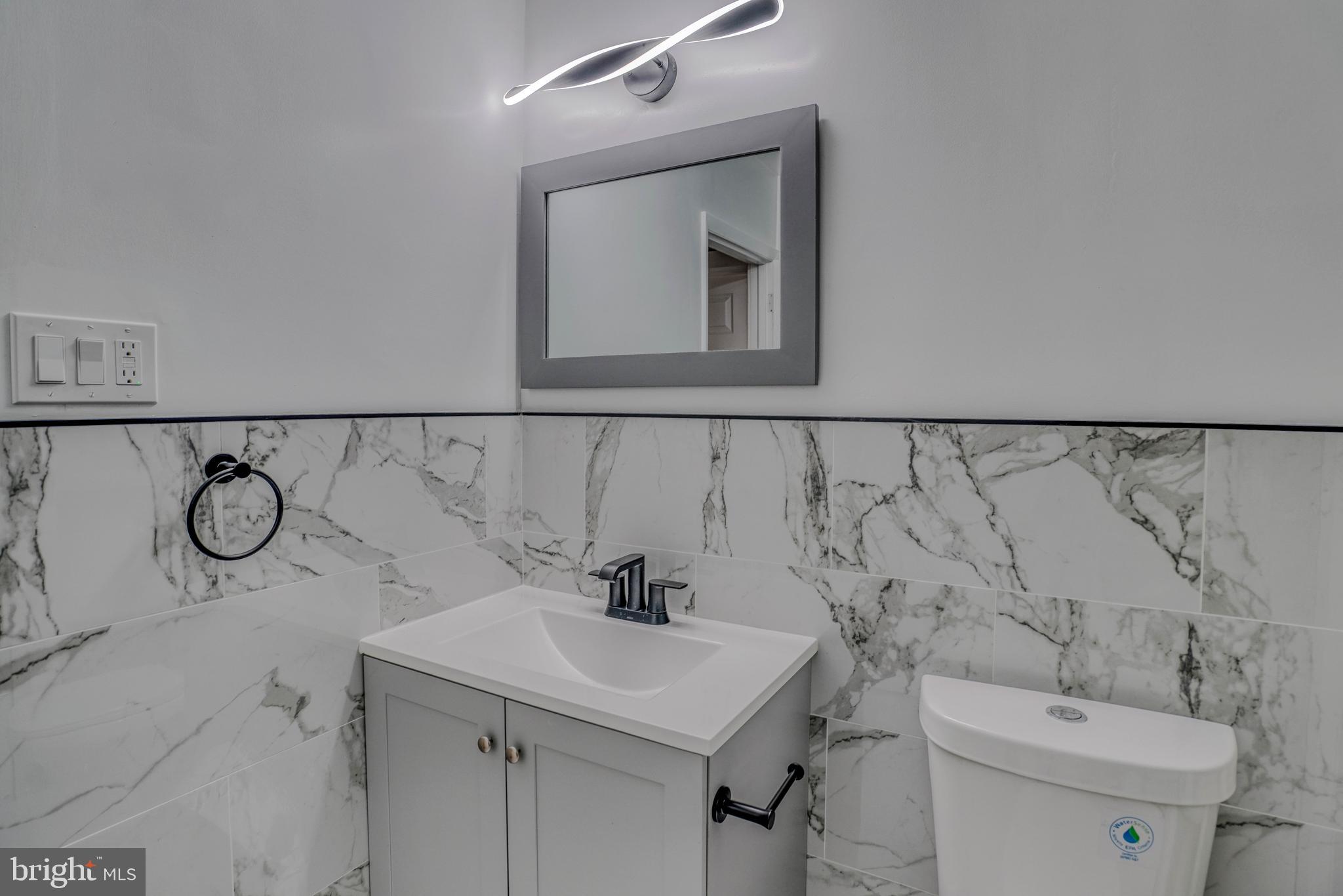 2135 Granite Street Philadelphia, PA 19124 - Photo 26 of 34 a bathroom with a sink and a toilet