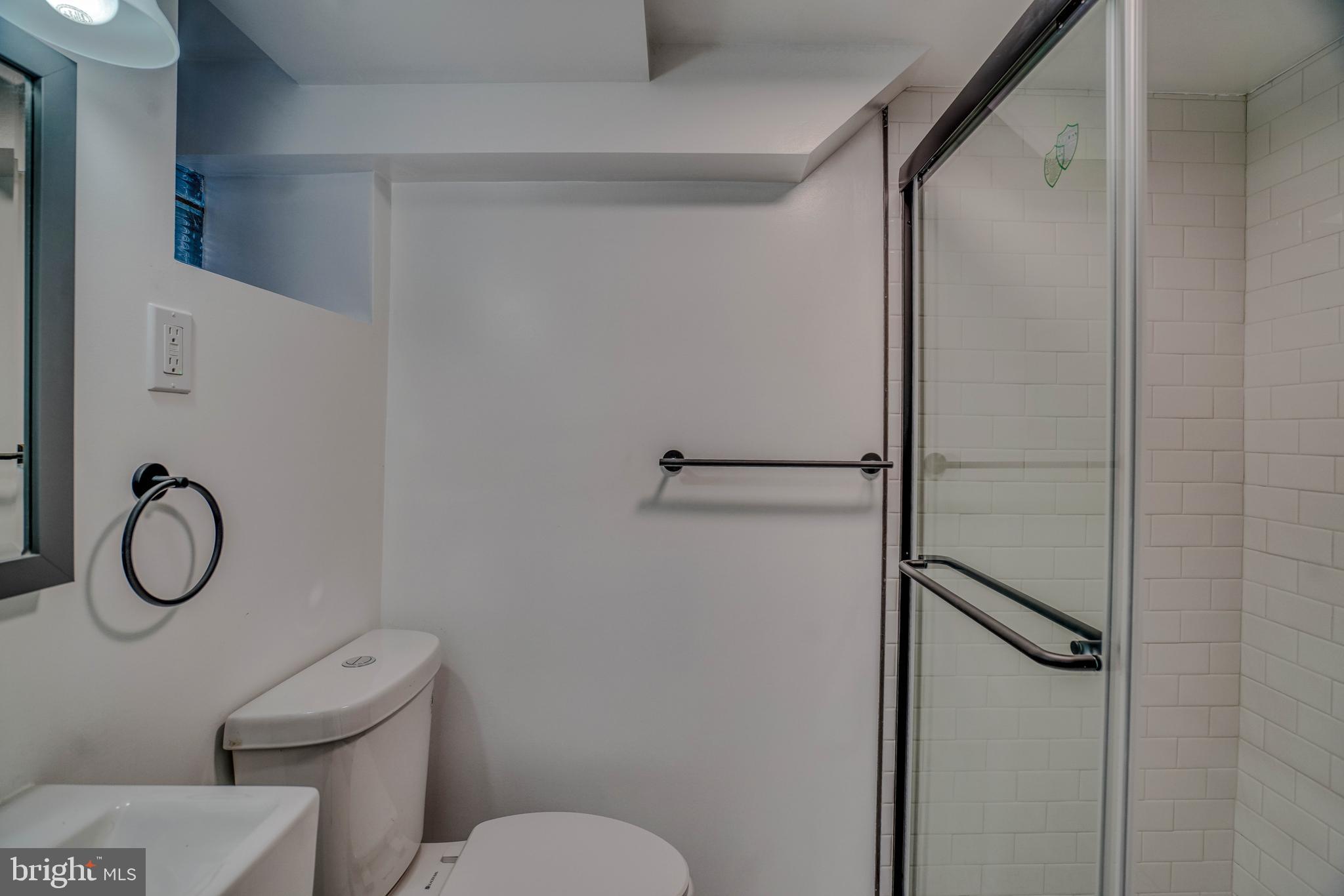 2135 Granite Street Philadelphia, PA 19124 - Photo 30 of 34 a bathroom with a toilet and a shower
