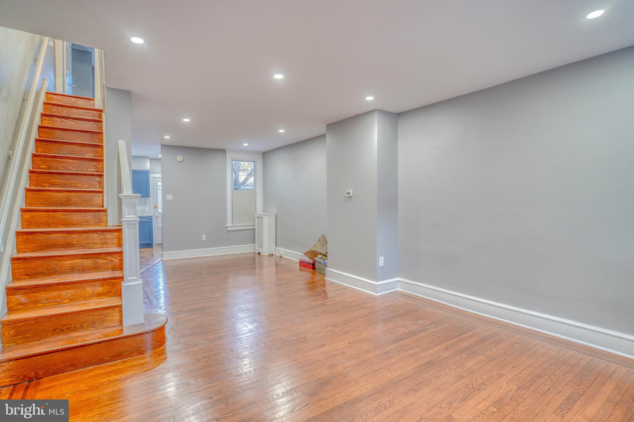 2135 Granite Street Philadelphia, PA 19124 - Photo 3 of 34 a view of room with stairs and wooden floor