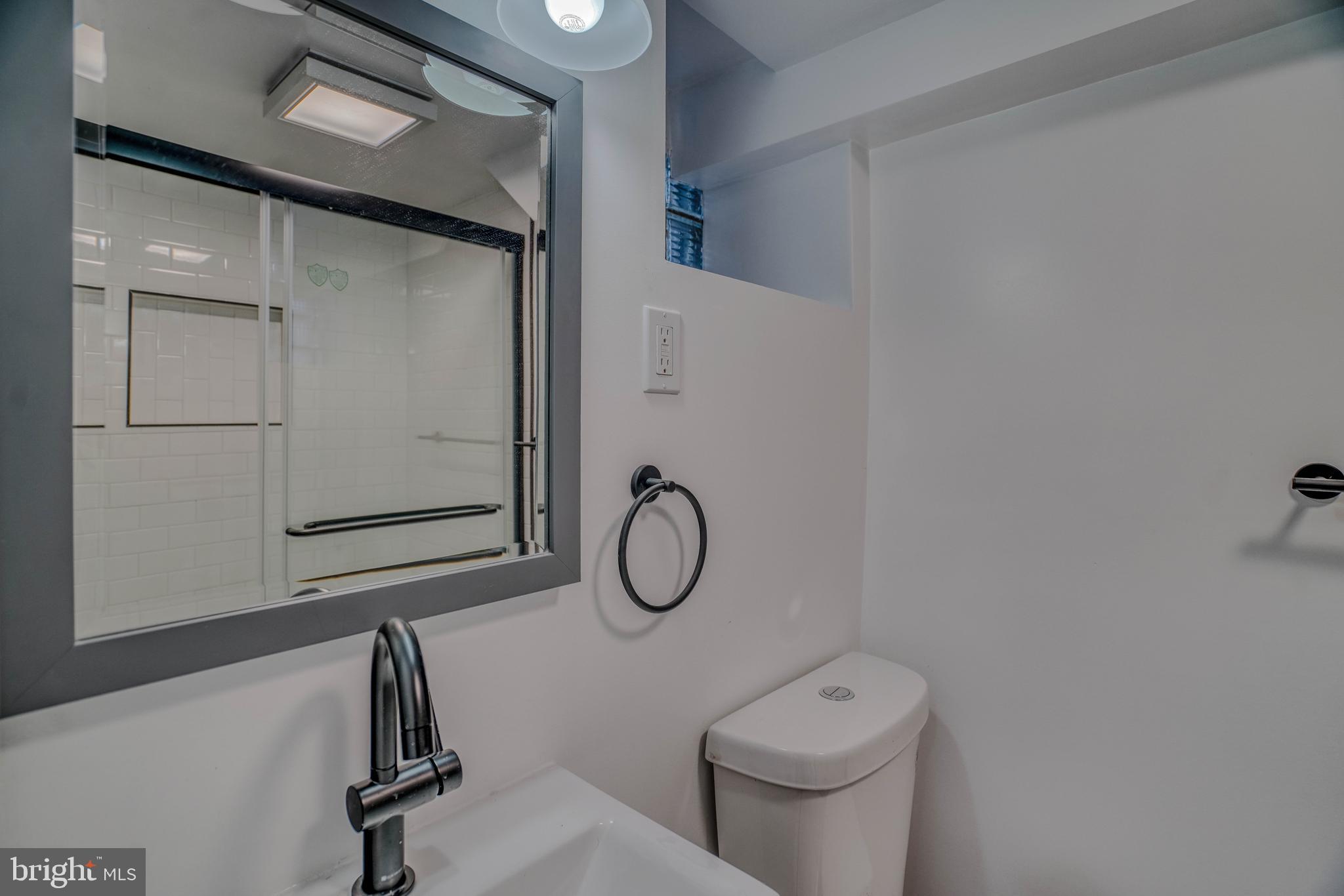 2135 Granite Street Philadelphia, PA 19124 - Photo 31 of 34 a bathroom with a toilet sink and tub