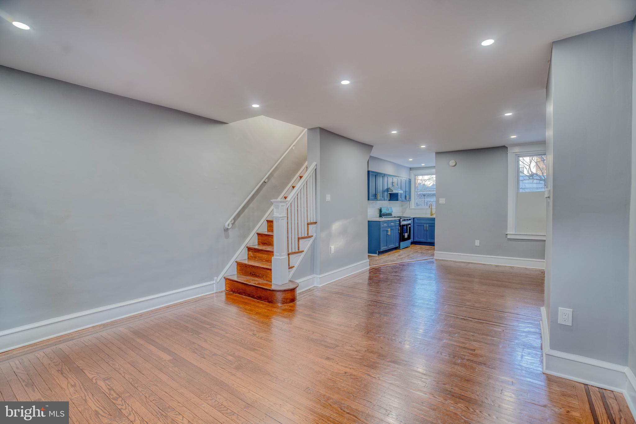 2135 Granite Street Philadelphia, PA 19124 - Photo 5 of 34 a view of entryway and kitchen with wooden floor