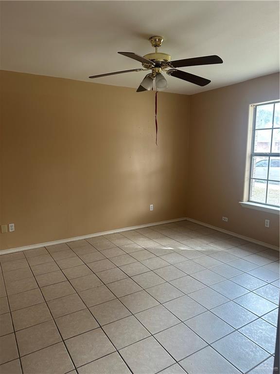 1213 Prosperity Drive, Unit D Edinburg, TX 78541 - Photo 5 of 10 a view of an empty room and a window