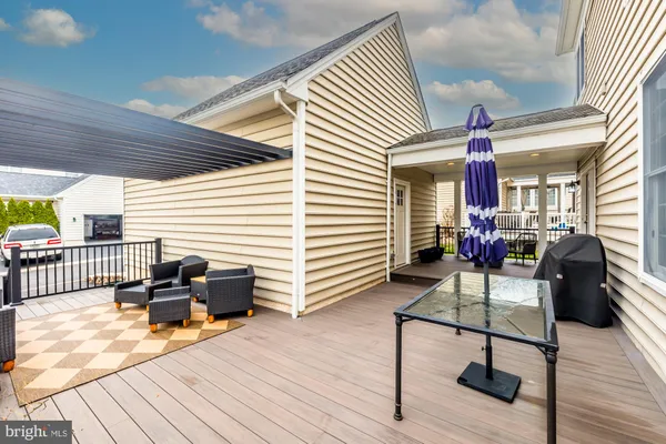 a view of a livingroom with furniture and wooden floor