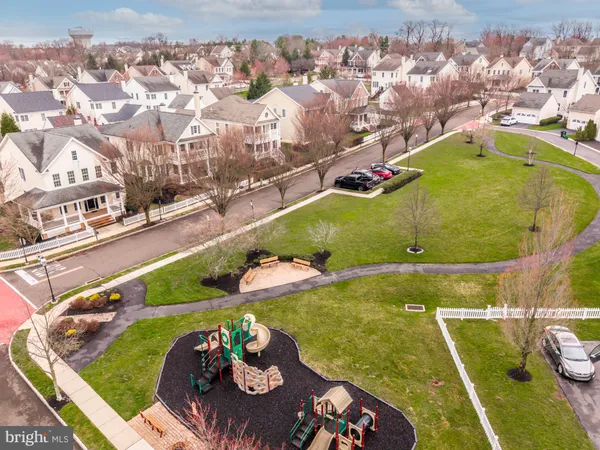 a view of a swimming pool in a backyard
