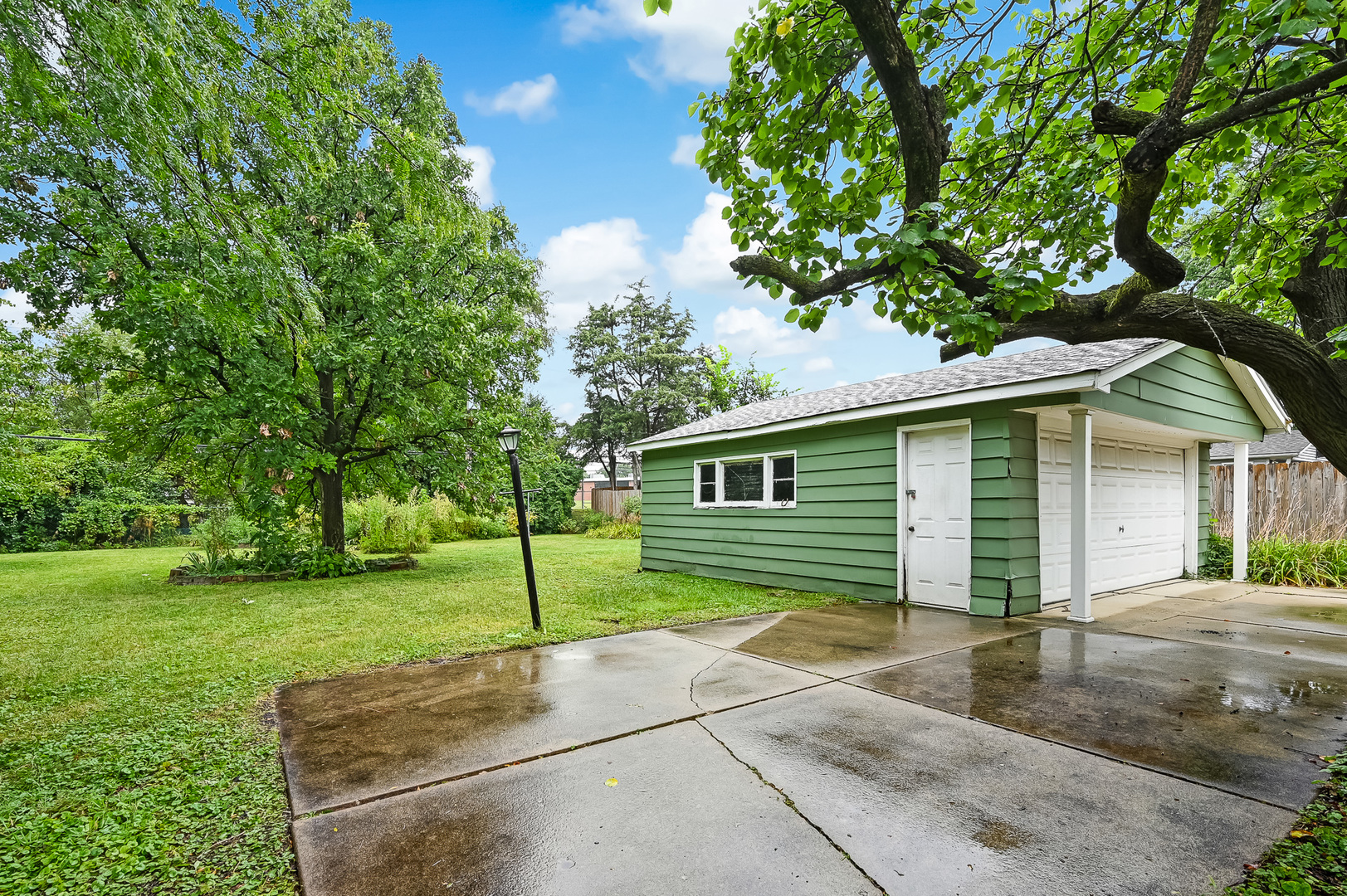 1018 Rolling Drive Lisle, IL 60532 - Photo 3 of 17 a view of a house with a backyard