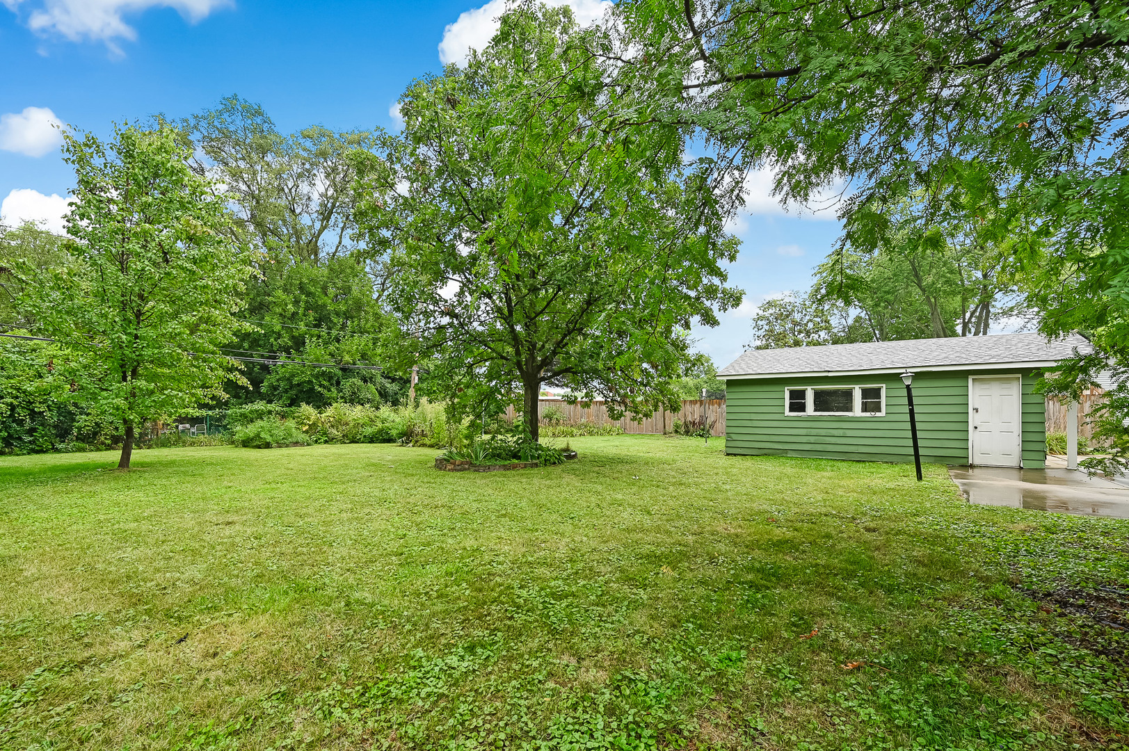 1018 Rolling Drive Lisle, IL 60532 - Photo 4 of 17 a view of a house with a big yard
