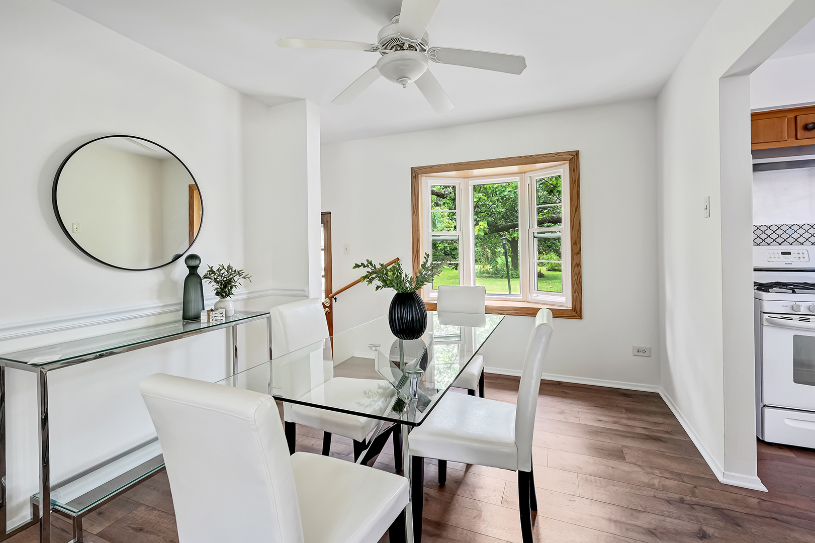 1018 Rolling Drive Lisle, IL 60532 - Photo 8 of 17 a view of a dining room with furniture window and wooden floor