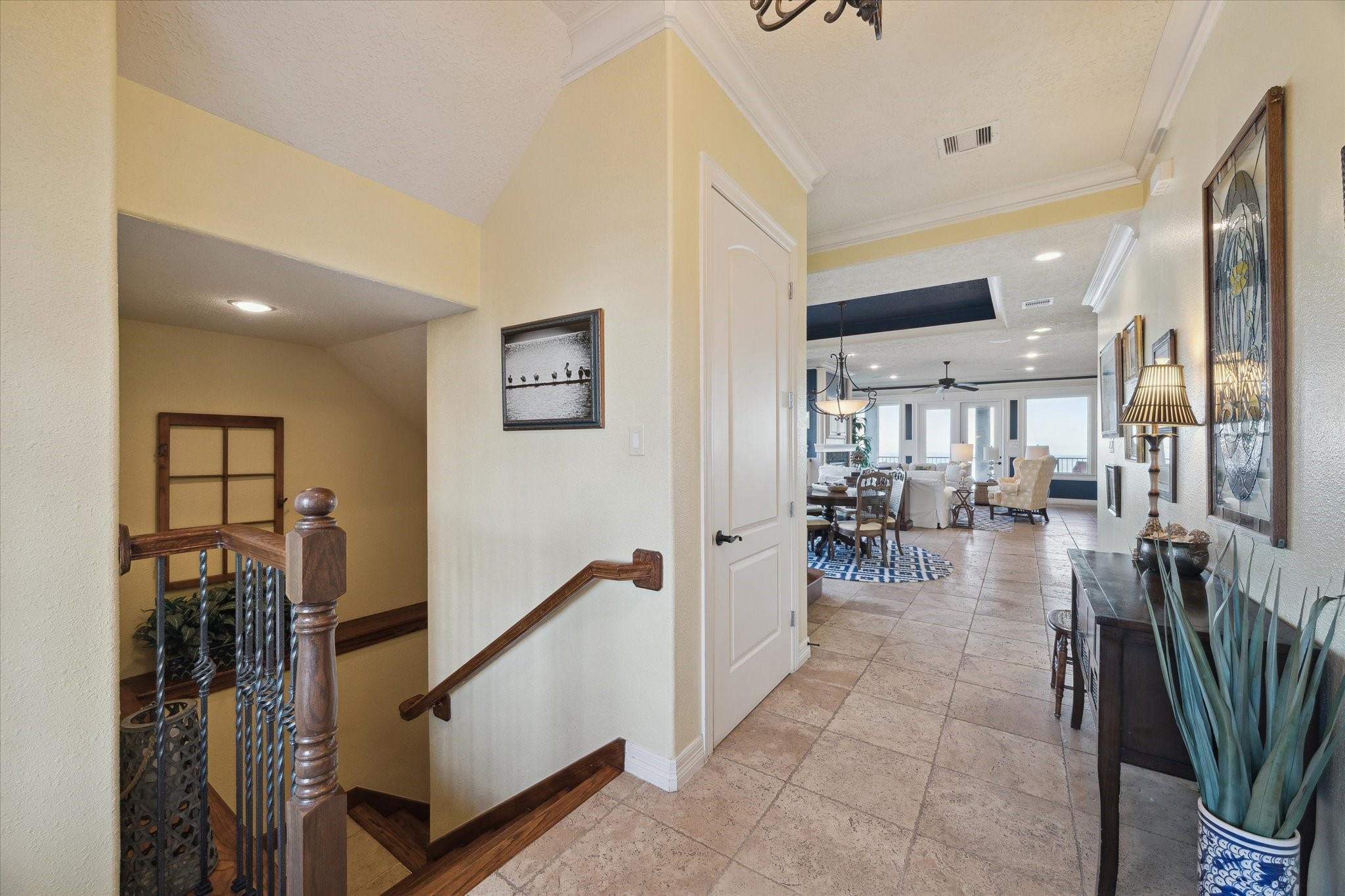 1406 Todville Road Seabrook, TX 77586 - Photo 11 of 50 DOUBLE DOORS OPEN TO REVEAL WATER VIEWS AS SOON AS YOU STEP IN. THE ELEVATOR SHAFT TO THE LEFT OPENS TO ALL 3 LEVELS.