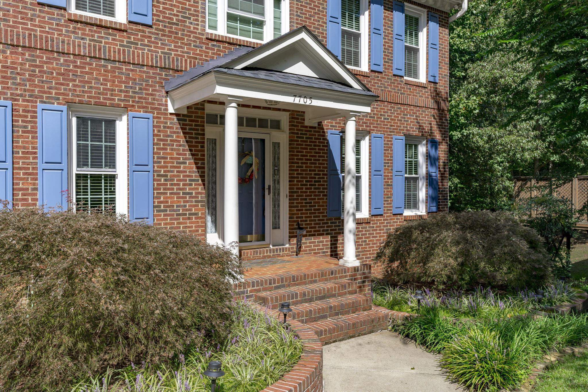7705 Tylerton Drive Raleigh, NC 27613 - Photo 2 of 35 Heavily Landscaped with Irrigation System