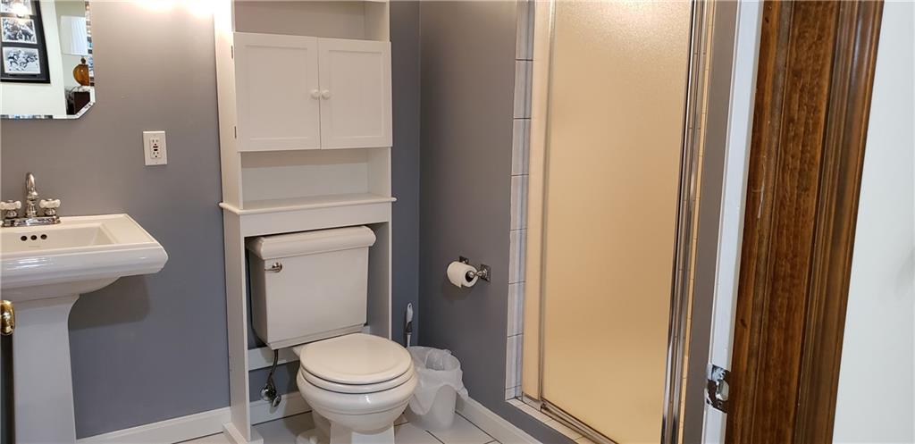 98 Fenway Road Pittsburgh, PA 15209 - Photo 22 of 25 Nicely updated Full bathroom in finished lower level. Large Ceramic Shower with double shower heads