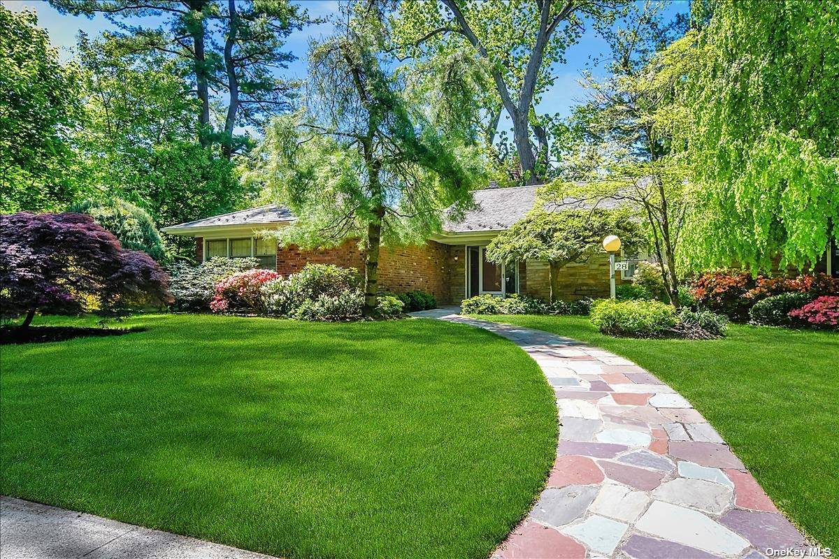 28 Merrivale Road Great Neck, NY 11020 - Photo 1 of 1 a view of a house with garden