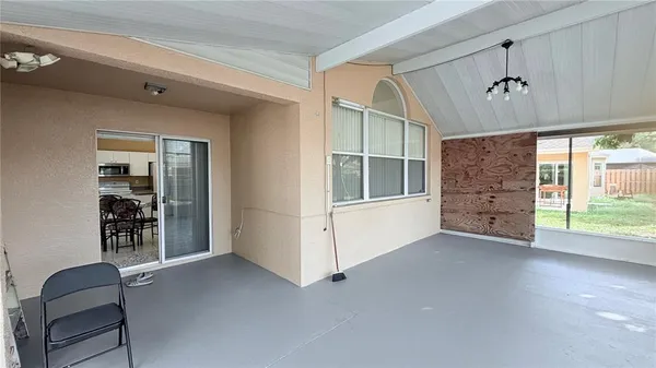 a view of a livingroom with furniture and windows