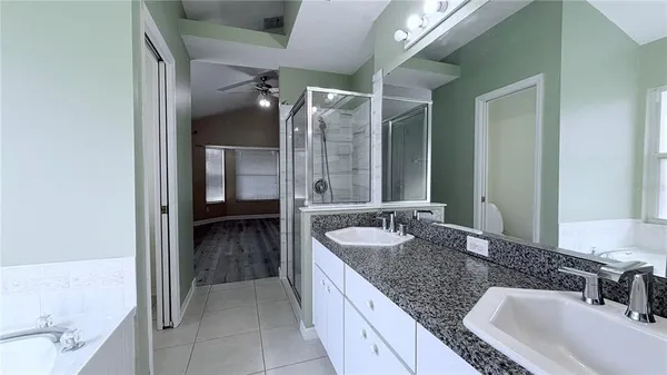 a view of a bathroom with shower