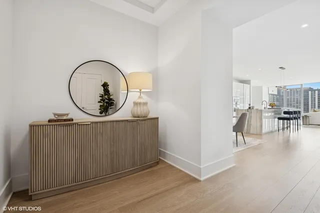 a view of a livingroom with furniture and wooden floor