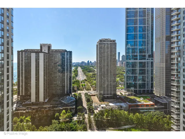 a view of a city with tall buildings