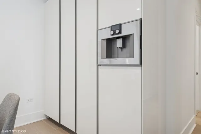 a view of hallway with washer and dryer